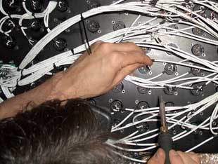 Wiring the cabling to the stage panel